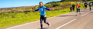 MM Volunteer running in a marathon to raise money for charity.