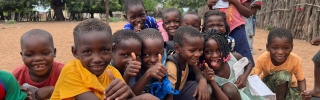 A group of friends together at school in Mozambique.